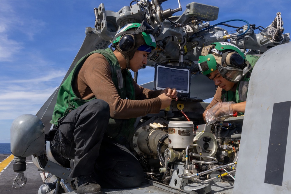 Iwo Jima Sailors Conduct Aircraft Maintenance