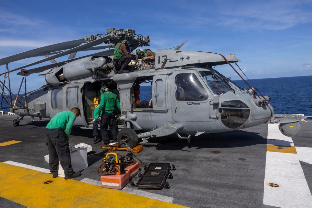 Iwo Jima Sailors Conduct Aircraft Maintenance