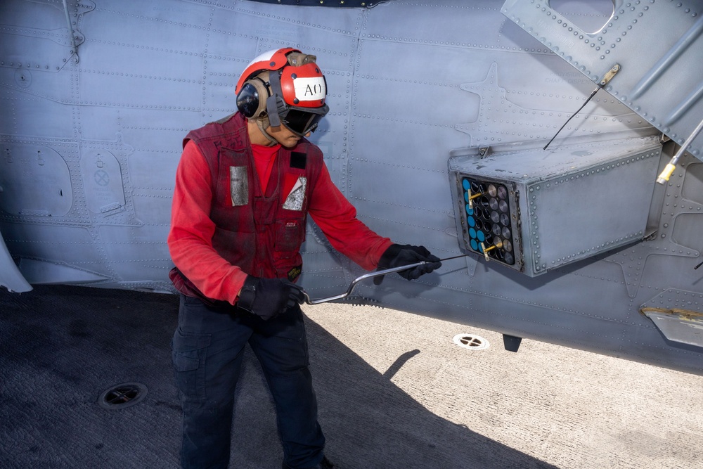 Iwo Jima Sailors Conduct Aircraft Maintenance