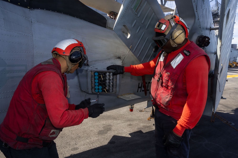 Iwo Jima Sailors Conduct Aircraft Maintenance