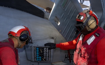 Iwo Jima Sailors Conduct Aircraft Maintenance