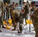 U.S. Marines with Marine Corps Base Quantico Shovel Snow for the Crossroads Elementary School