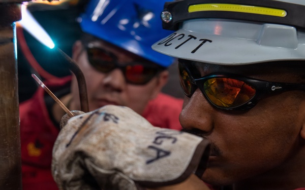 Ronald Reagan Sailors Work on Ship Components