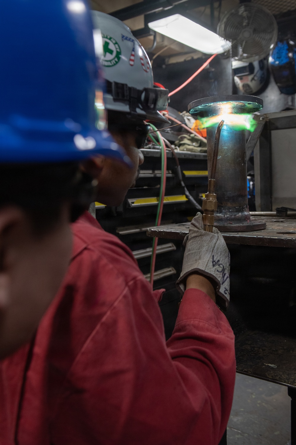 Ronald Reagan Sailors Work on Ship Components