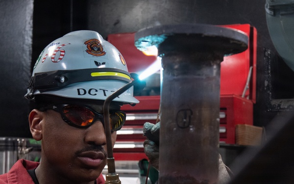 Ronald Reagan Sailors Work on Ship Components