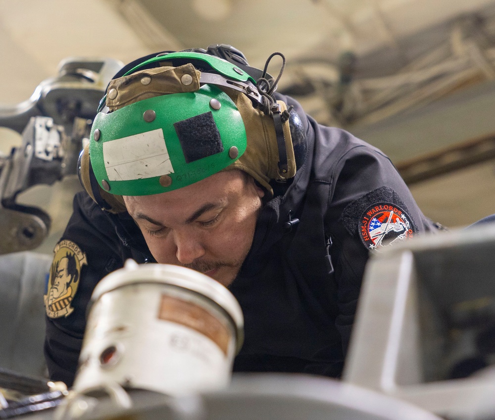 Sailors Assigned to HSM 51 Conduct Maintenance on Helicopters Aboard USS Dewey