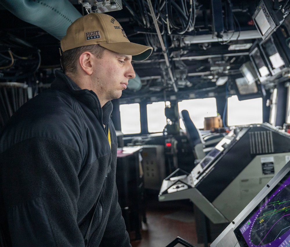 Sailors Aboard the USS Dewey Stand Watch While Operating in the Sea of Japan