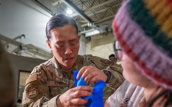 Senior Airman rises up, provides mass training to over 200 Airmen before deployment exercise
