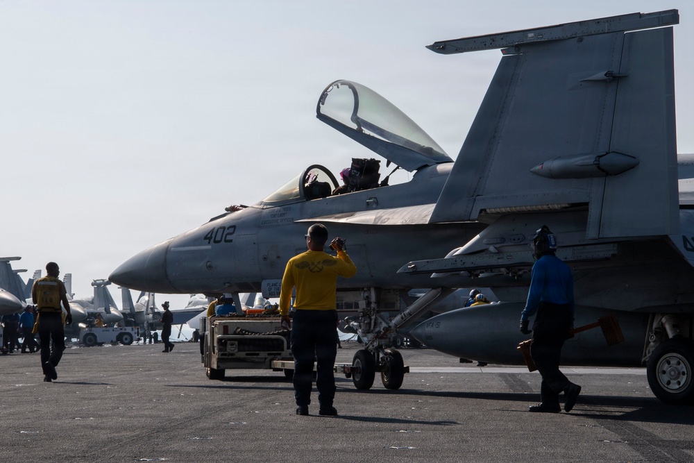 Abraham Lincoln conducts routine aircraft maintenance