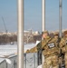 Service members clear snow at the Washington Monument