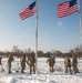 Service members clear snow at the Washington Monument