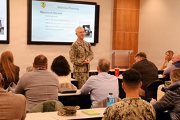 Vice Adm. Baze Greets the Interview and Interrogation Training Course