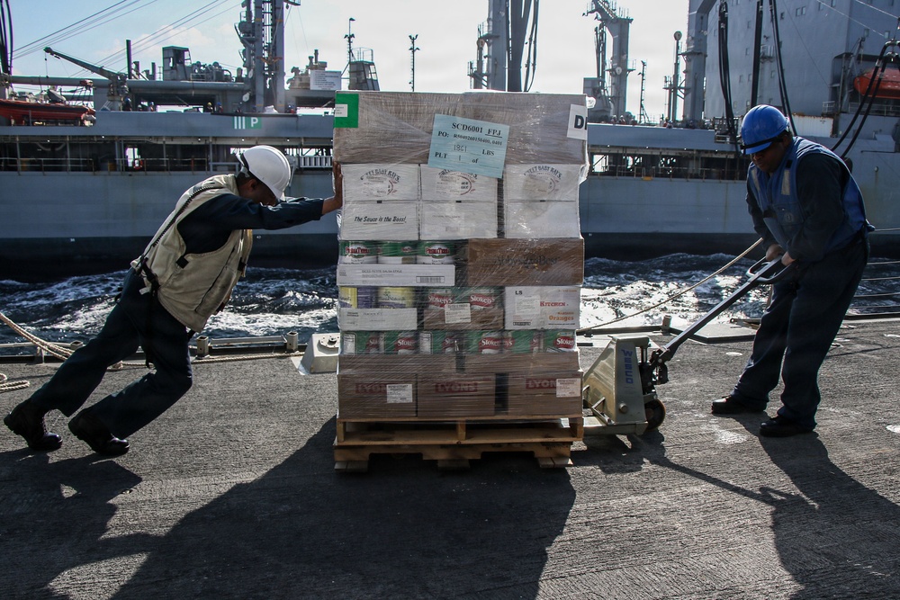 Frank E. Petersen Jr. conducts replenishment-at-sea with Henry J. Kaiser