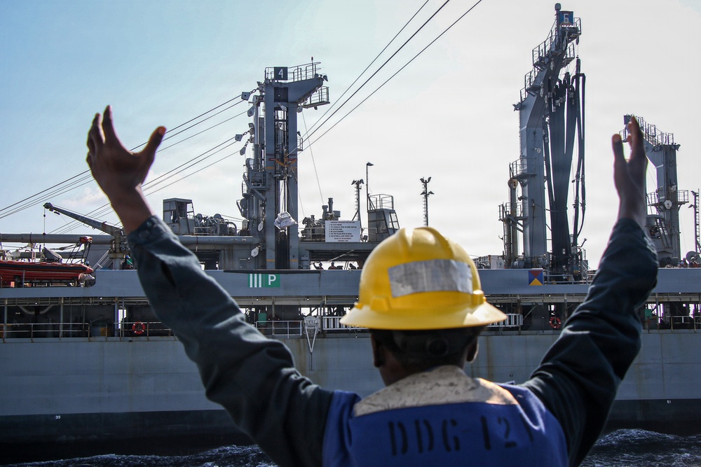 Frank E. Petersen Jr. conducts replenishment-at-sea with Henry J. Kaiser
