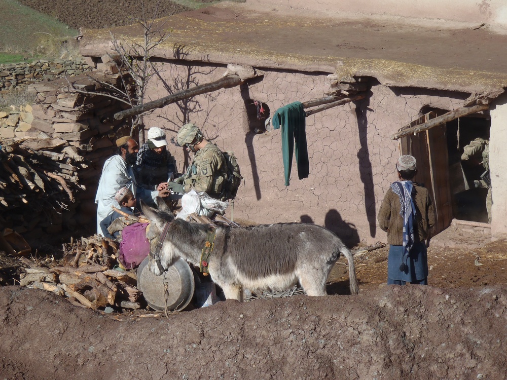 Soldier scanning a villager