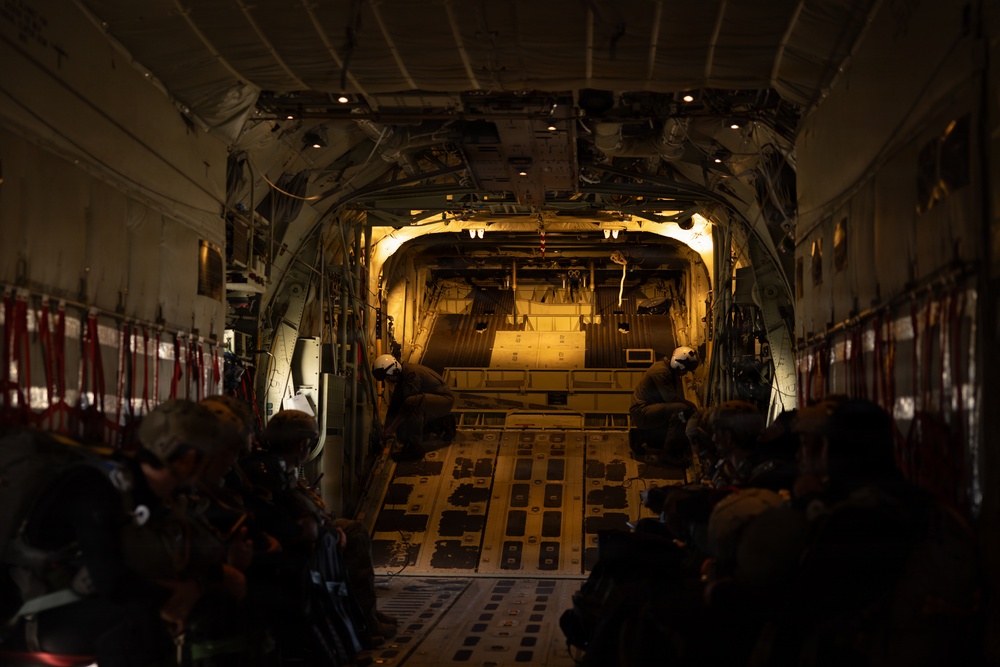 Navy EOD Mobile Unit 1 conducts KC-130J static line jump