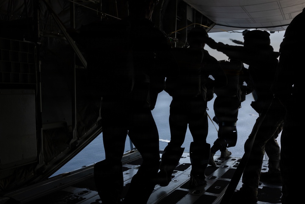 Navy EOD Mobile Unit 1 conducts KC-130J static line jump