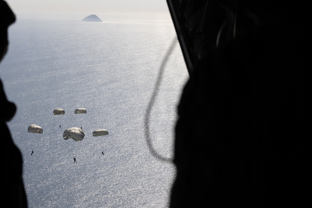 Navy EOD Mobile Unit 1 conducts KC-130J static line jump