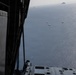 Navy EOD Mobile Unit 1 conducts KC-130J static line jump