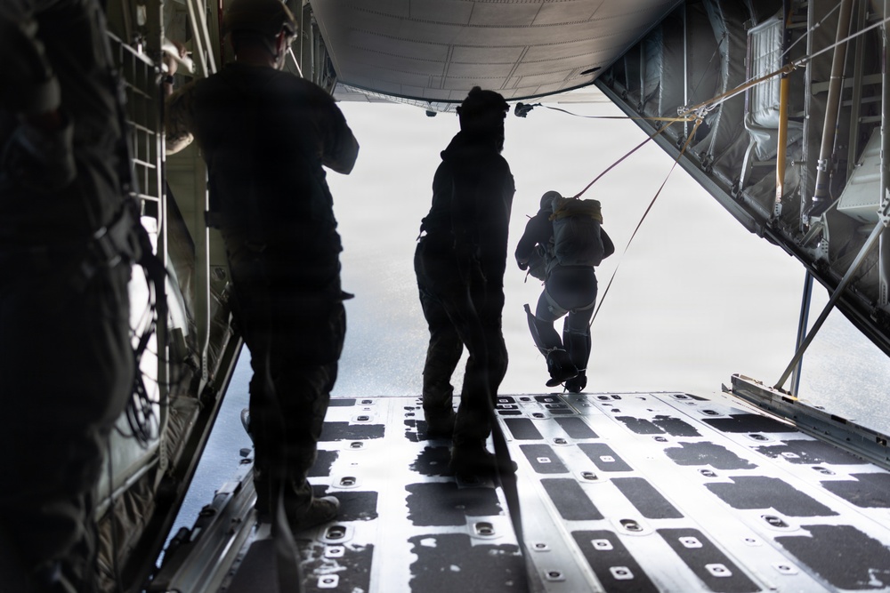 Navy EOD Mobile Unit 1 conducts KC-130J static line jump