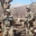 Soldiers pause in village Soldiers pause in village