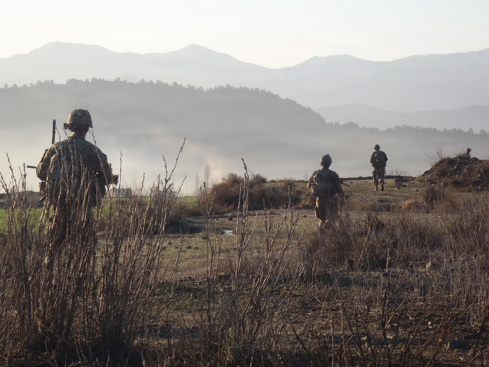 Soldiers patrol in the mist