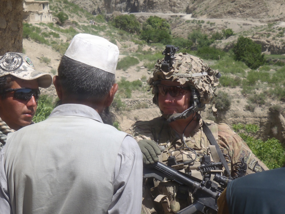 First Sergeant speaks to villagers
