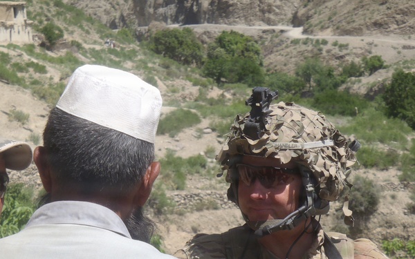 First Sergeant speaks to villagers