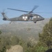UH-60 hoists soldier