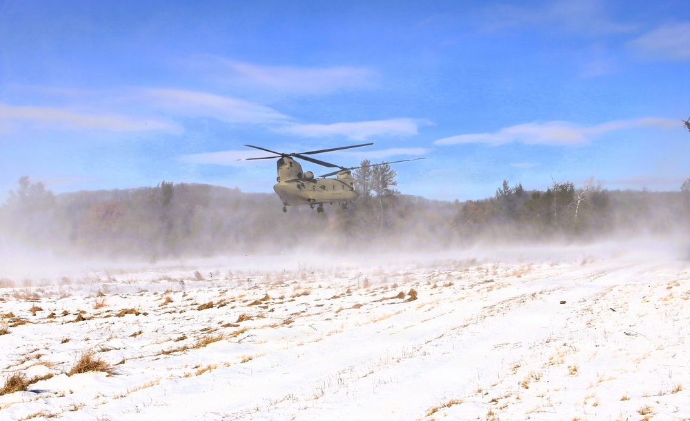 2nd Battalion, 147th Aviation Regiment helicopters, crews support sling-load training event with artillery unit at Fort McCoy