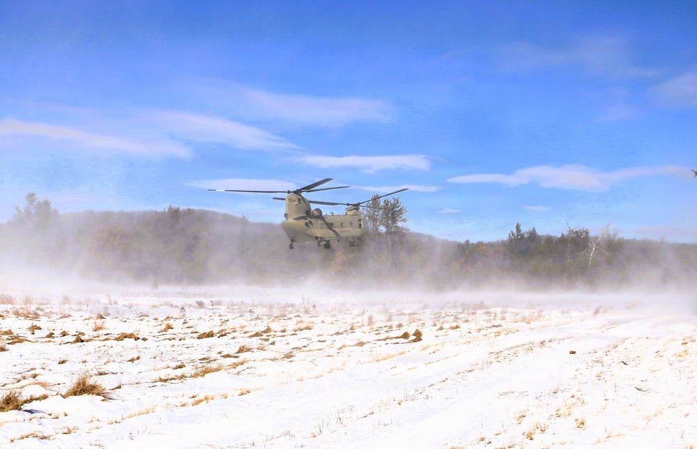 2nd Battalion, 147th Aviation Regiment helicopters, crews support sling-load training event with artillery unit at Fort McCoy