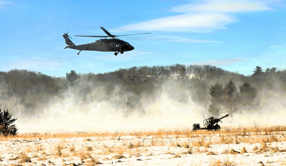 2nd Battalion, 147th Aviation Regiment helicopters, crews support sling-load training event with artillery unit at Fort McCoy