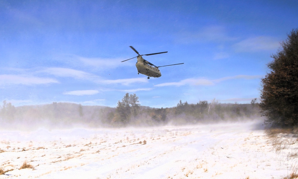 2nd Battalion, 147th Aviation Regiment helicopters, crews support sling-load training event with artillery unit at Fort McCoy