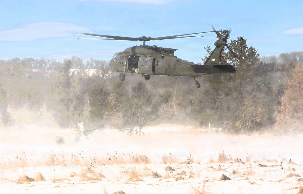 2nd Battalion, 147th Aviation Regiment helicopters, crews support sling-load training event with artillery unit at Fort McCoy