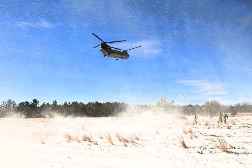 2nd Battalion, 147th Aviation Regiment helicopters, crews support sling-load training event with artillery unit at Fort McCoy