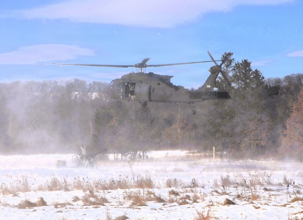 2nd Battalion, 147th Aviation Regiment helicopters, crews support sling-load training event with artillery unit at Fort McCoy