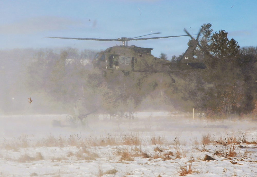 2nd Battalion, 147th Aviation Regiment helicopters, crews support sling-load training event with artillery unit at Fort McCoy