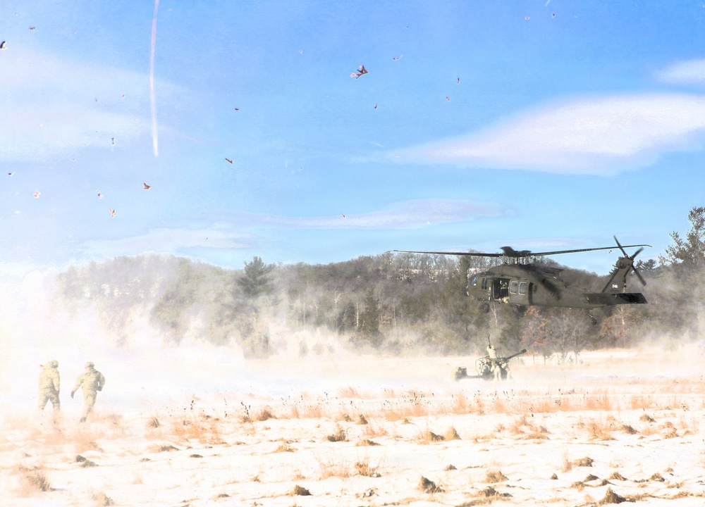 2nd Battalion, 147th Aviation Regiment helicopters, crews support sling-load training event with artillery unit at Fort McCoy