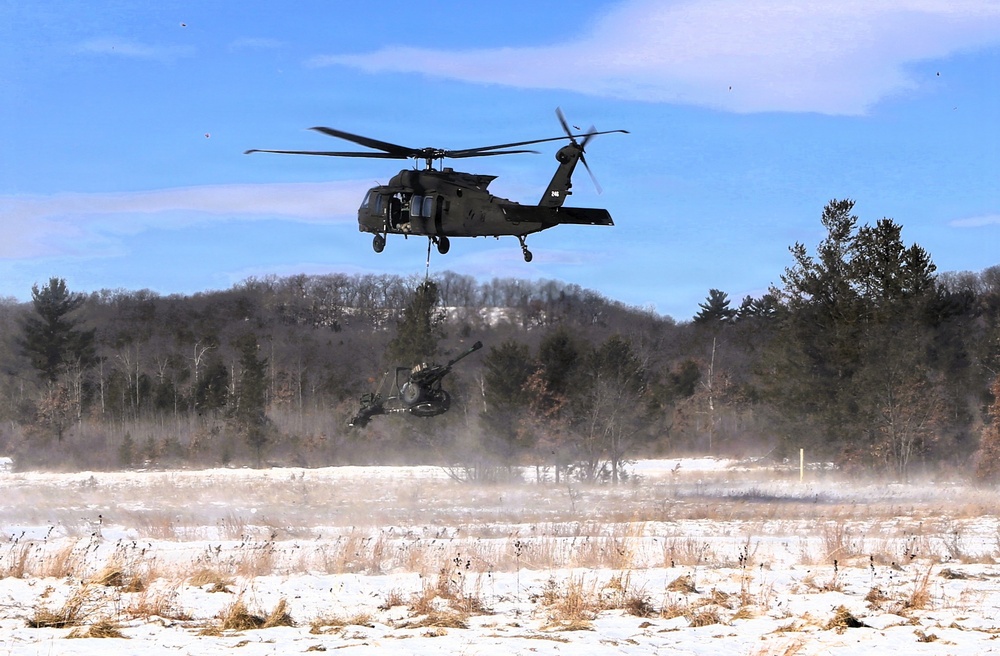 2nd Battalion, 147th Aviation Regiment helicopters, crews support sling-load training event with artillery unit at Fort McCoy