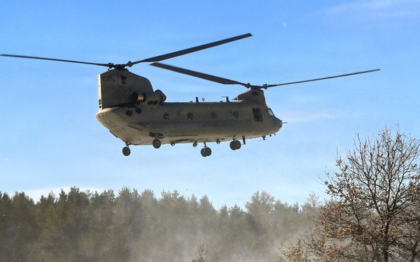 2nd Battalion, 147th Aviation Regiment helicopters, crews support sling-load training event with artillery unit at Fort McCoy