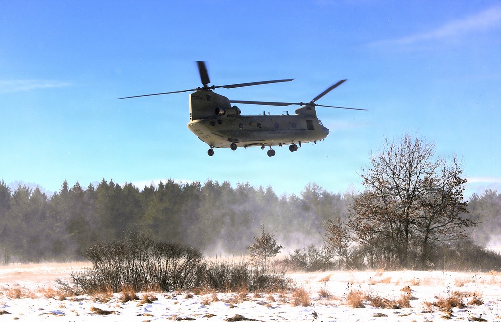 2nd Battalion, 147th Aviation Regiment helicopters, crews support sling-load training event with artillery unit at Fort McCoy