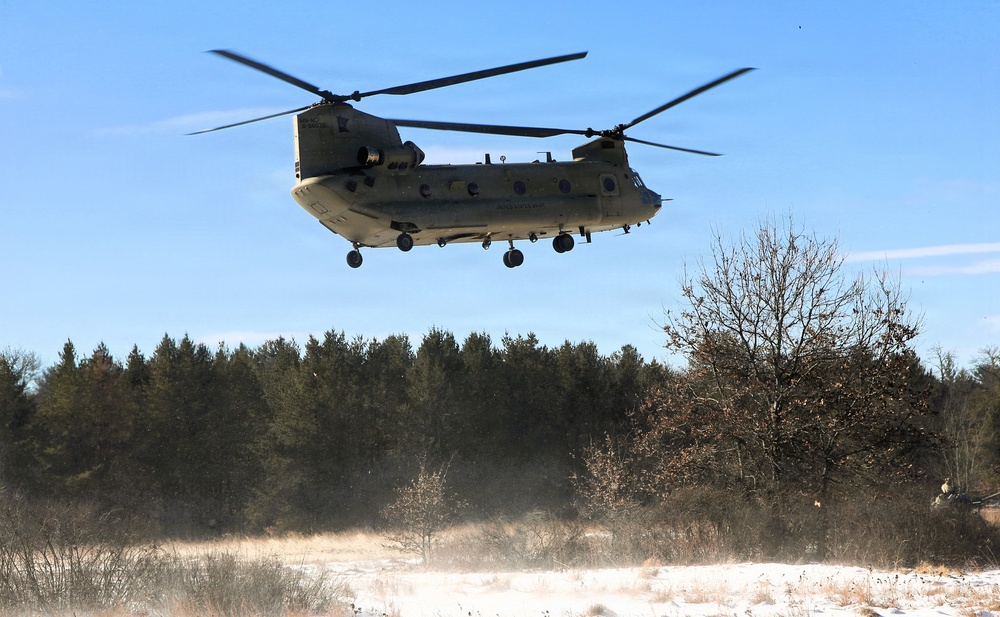 2nd Battalion, 147th Aviation Regiment helicopters, crews support sling-load training event with artillery unit at Fort McCoy