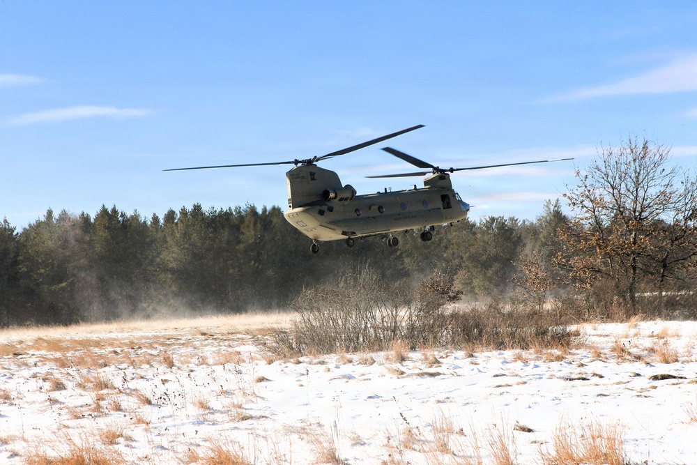 2nd Battalion, 147th Aviation Regiment helicopters, crews support sling-load training event with artillery unit at Fort McCoy