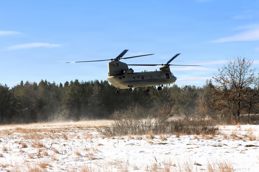 2nd Battalion, 147th Aviation Regiment helicopters, crews support sling-load training event with artillery unit at Fort McCoy