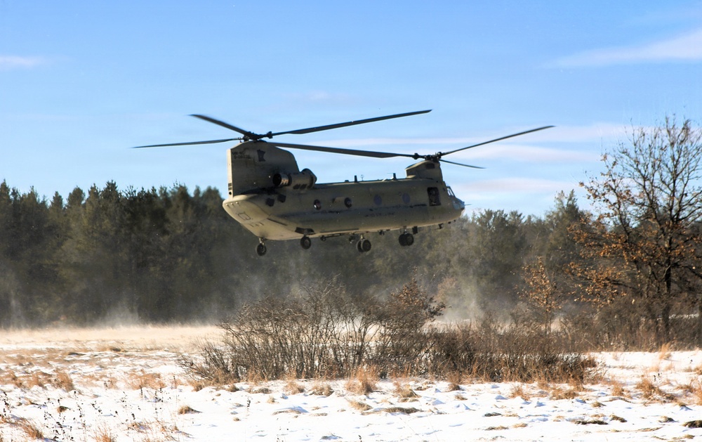 2nd Battalion, 147th Aviation Regiment helicopters, crews support sling-load training event with artillery unit at Fort McCoy