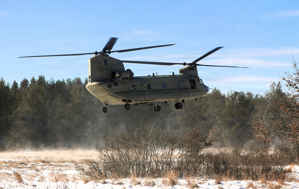 2nd Battalion, 147th Aviation Regiment helicopters, crews support sling-load training event with artillery unit at Fort McCoy