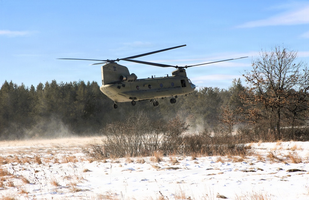 2nd Battalion, 147th Aviation Regiment helicopters, crews support sling-load training event with artillery unit at Fort McCoy