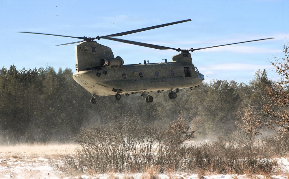 2nd Battalion, 147th Aviation Regiment helicopters, crews support sling-load training event with artillery unit at Fort McCoy