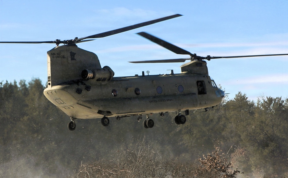 2nd Battalion, 147th Aviation Regiment helicopters, crews support sling-load training event with artillery unit at Fort McCoy