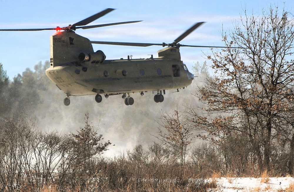 2nd Battalion, 147th Aviation Regiment helicopters, crews support sling-load training event with artillery unit at Fort McCoy